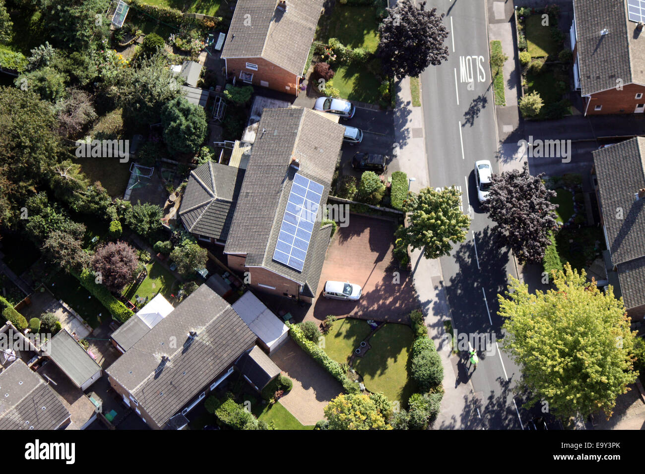 aerial view of a domestic house with solar panels on the roof, UK Stock