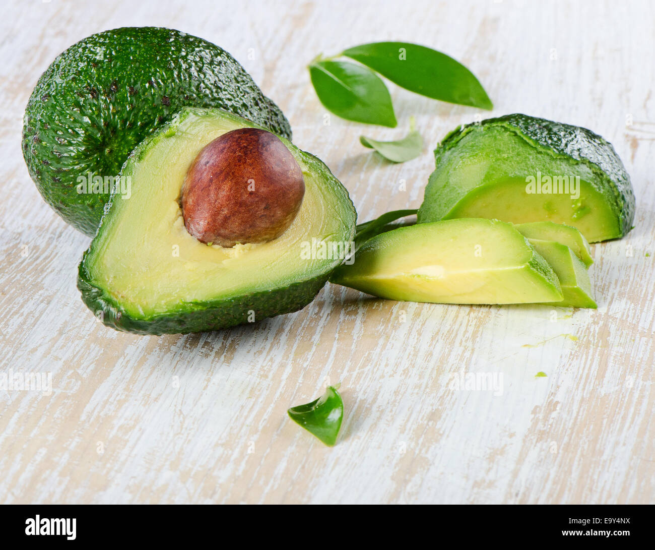 Avocado on a wooden table.Selective focus Stock Photo