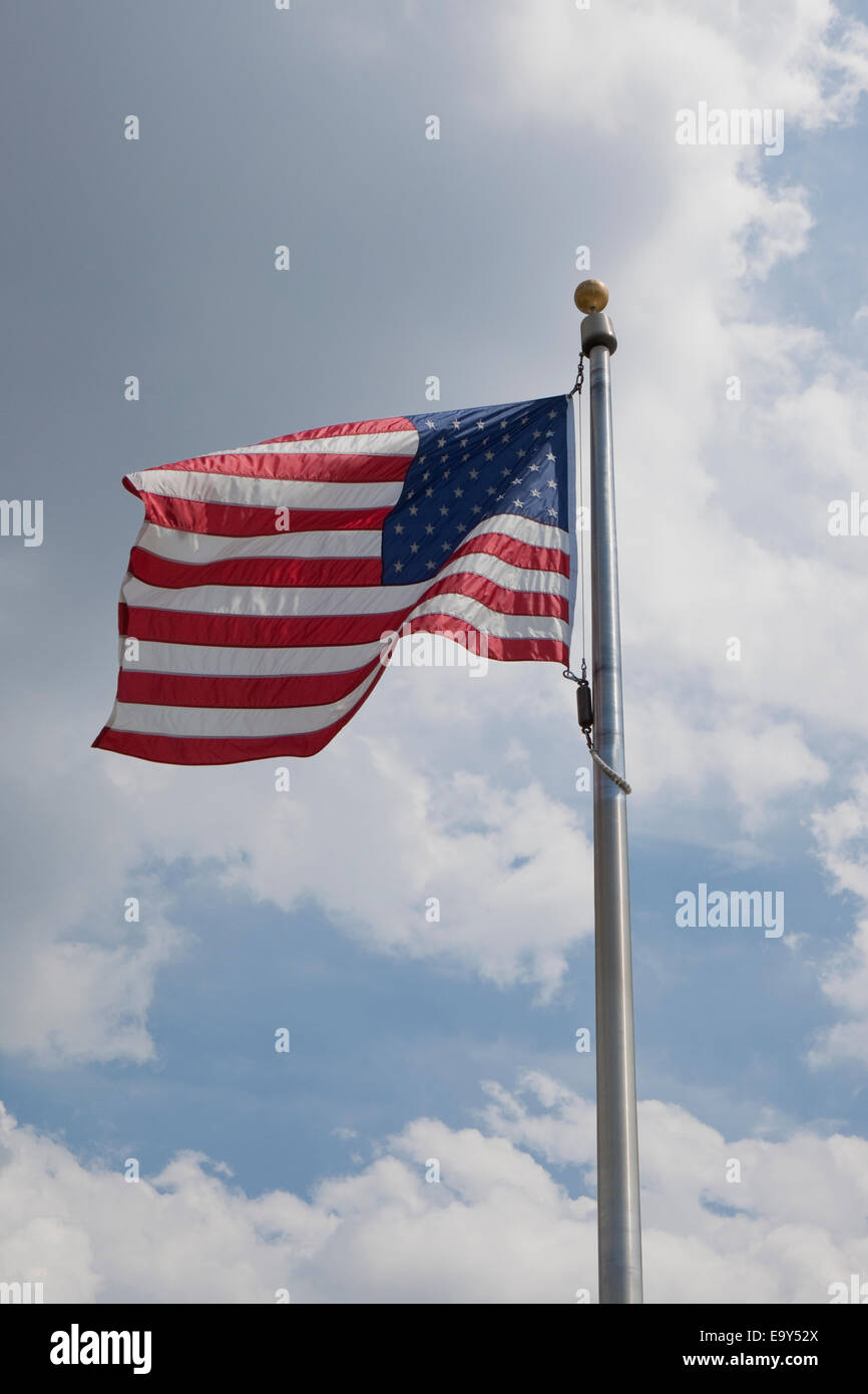 The United States of America flag blowing in the wind Stock Photo