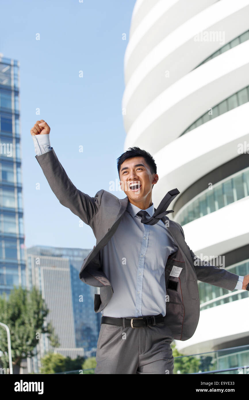Businessman cheering sky hi-res stock photography and images - Alamy