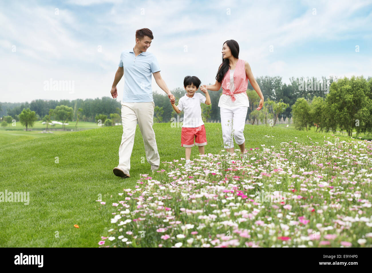 Boy with his parents Stock Photo - Alamy