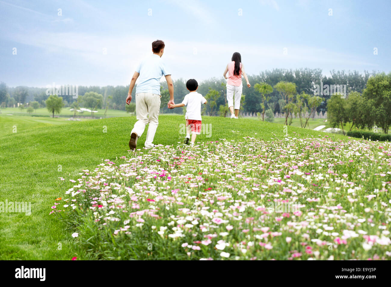 Boy with his parents Stock Photo - Alamy