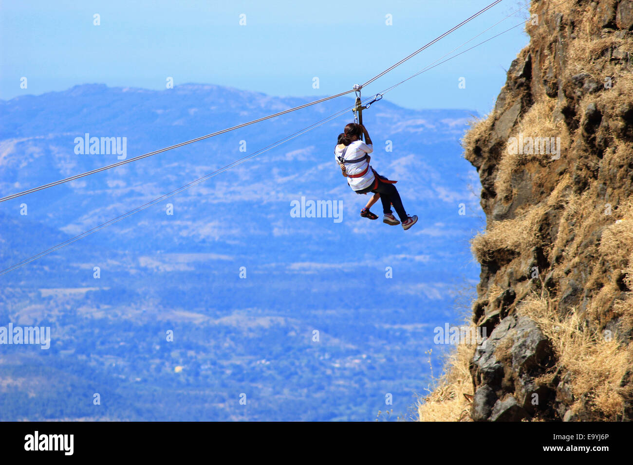 Ropeway with people crossing at Sinhagad fort, Pune district
