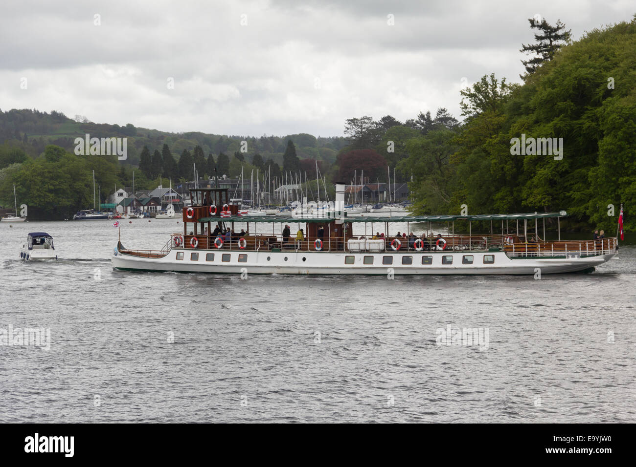 Windermere steamer MV Tern in Bowness Bay, approaching the pier Bowness-on-Windermere on a dull cloudy day in Spring. Stock Photo