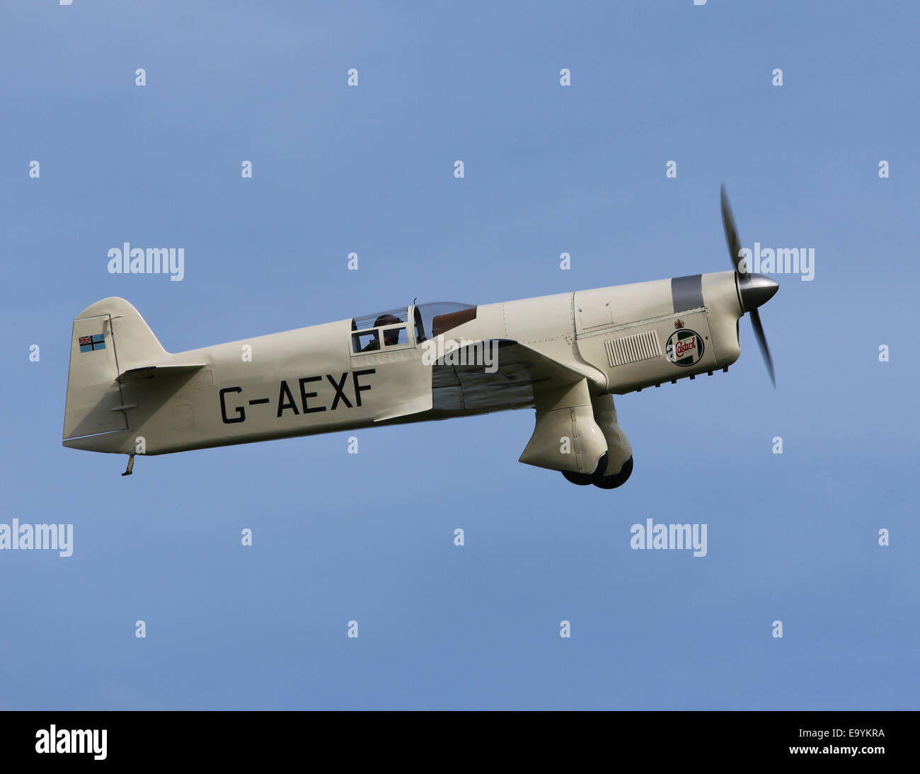 Percival Mew Gull G-AEXF, a British racing aircraft of the 1930s, flying at Old Warden Airfield, Bedfordshire, in October 2014 Stock Photo