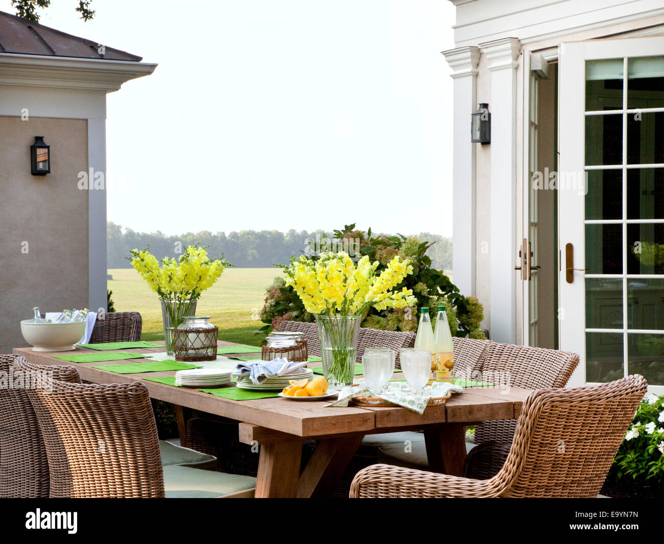 setting a table for outdoor dining in the countryside. Stock Photo