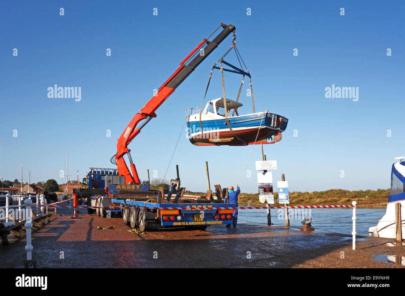 Lifting boat with mobile crane hi-res stock photography and images - Alamy