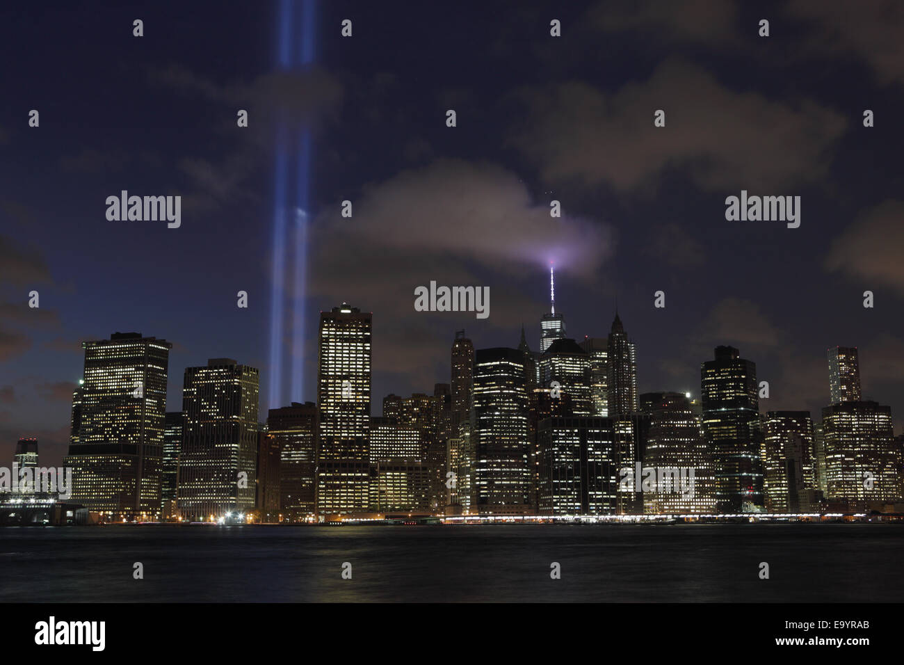 September 11 Tribute in Light beams viewed across the East River from Brooklyn 2014 Stock Photo