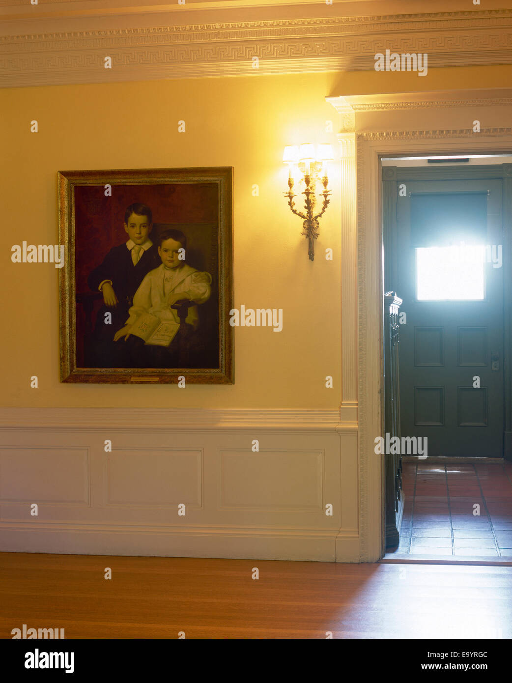 House entrance with painting of two young boys Stock Photo - Alamy