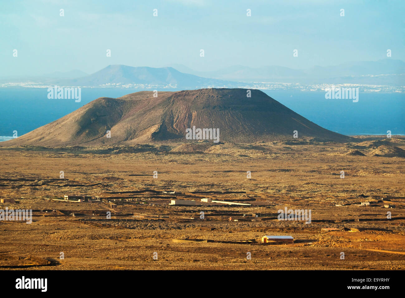 View from Calderon Honda to a volcanic cone near Corralejo, with Lanzarote beyond; Lajares, Fuerteventura, Canary Islands, Spain Stock Photo