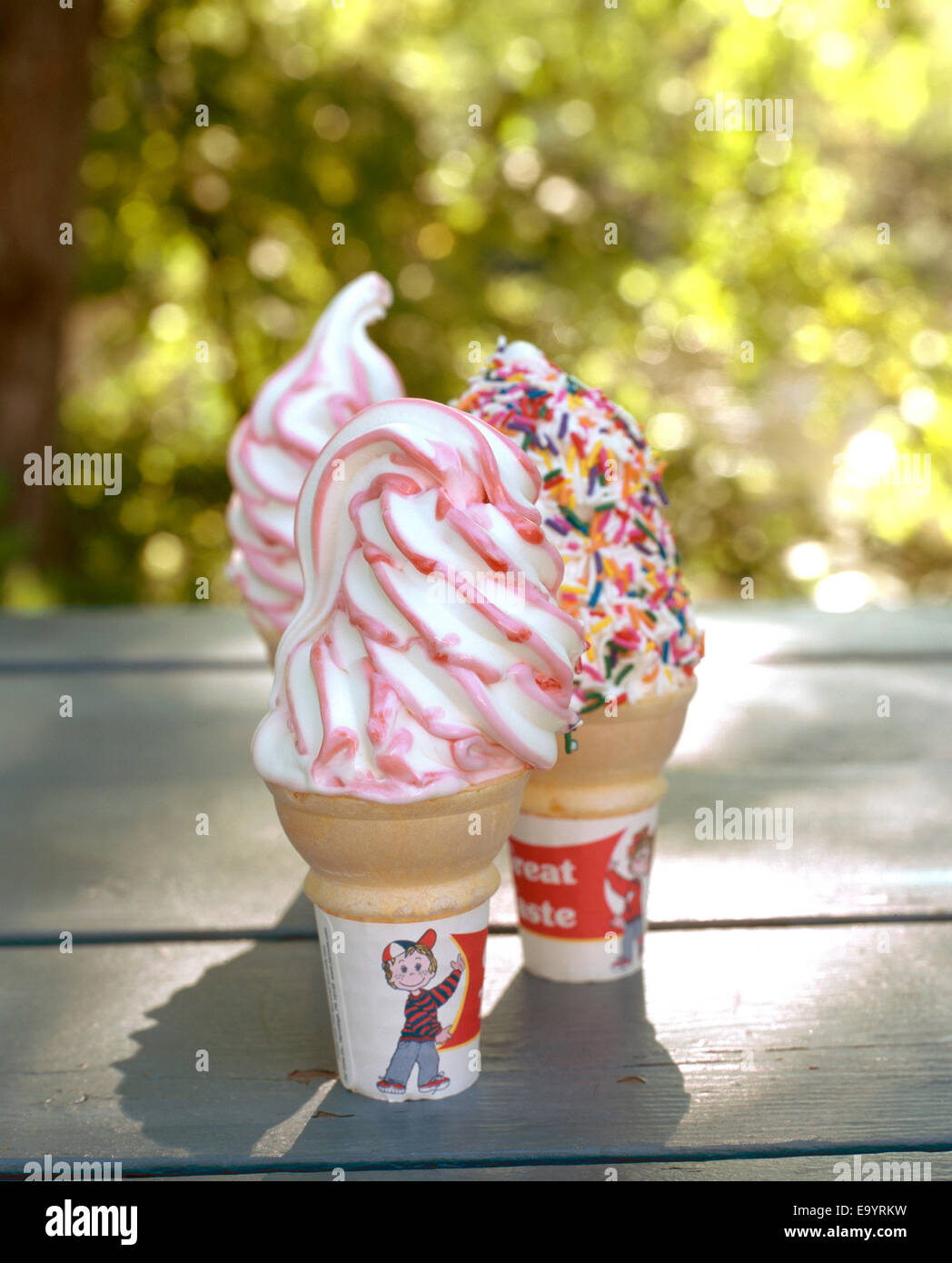 three soft serve ice creams in cones Stock Photo