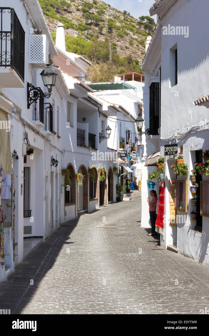 Typical white-washed houses and shops in Mijas town centre Stock Photo