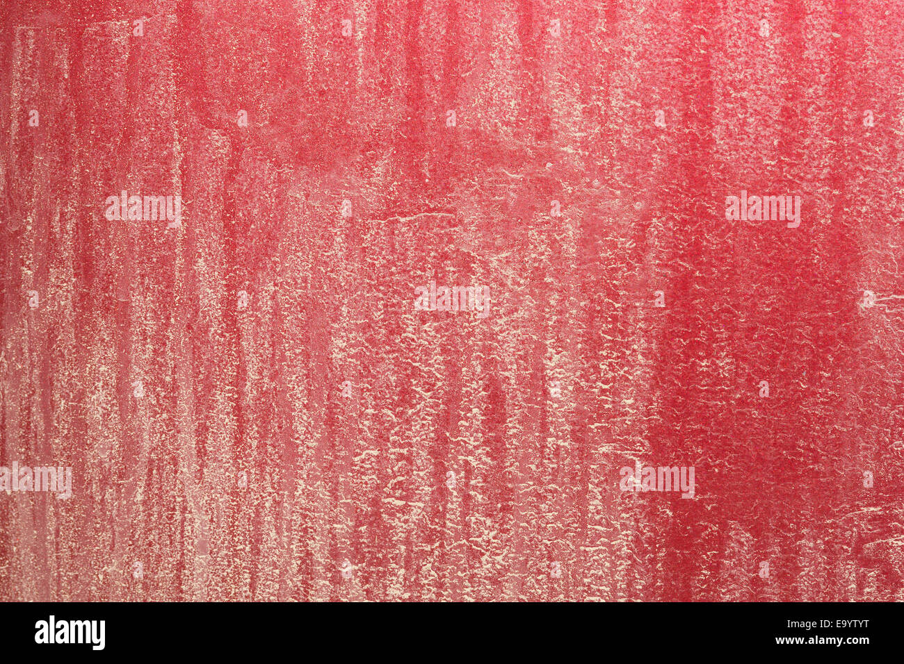 A very close view of an exceptionally dirty red car rear bumper. Stock Photo