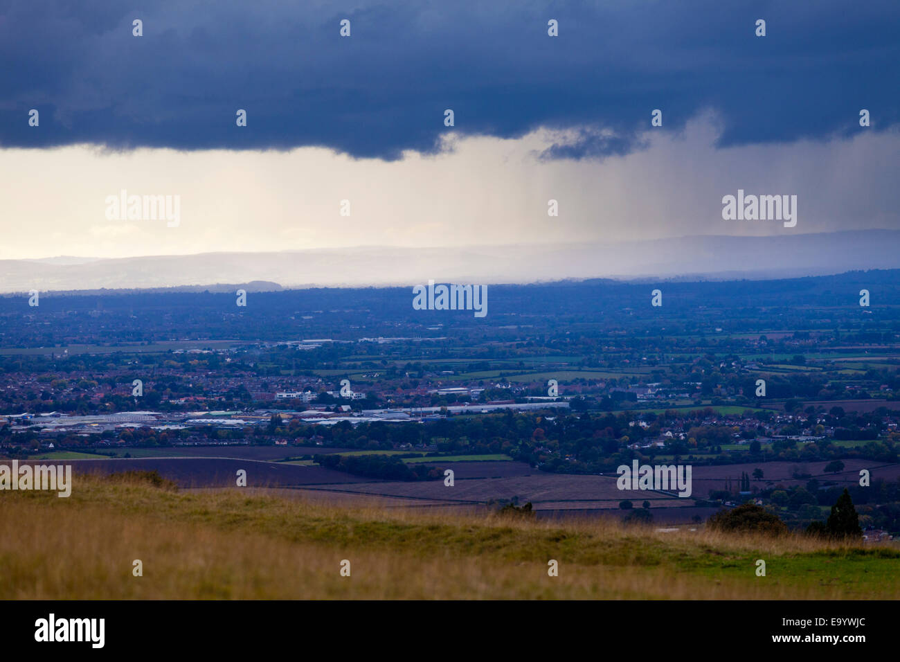 A rainstorm approaching the highest point of the Cotswolds at Cleeve