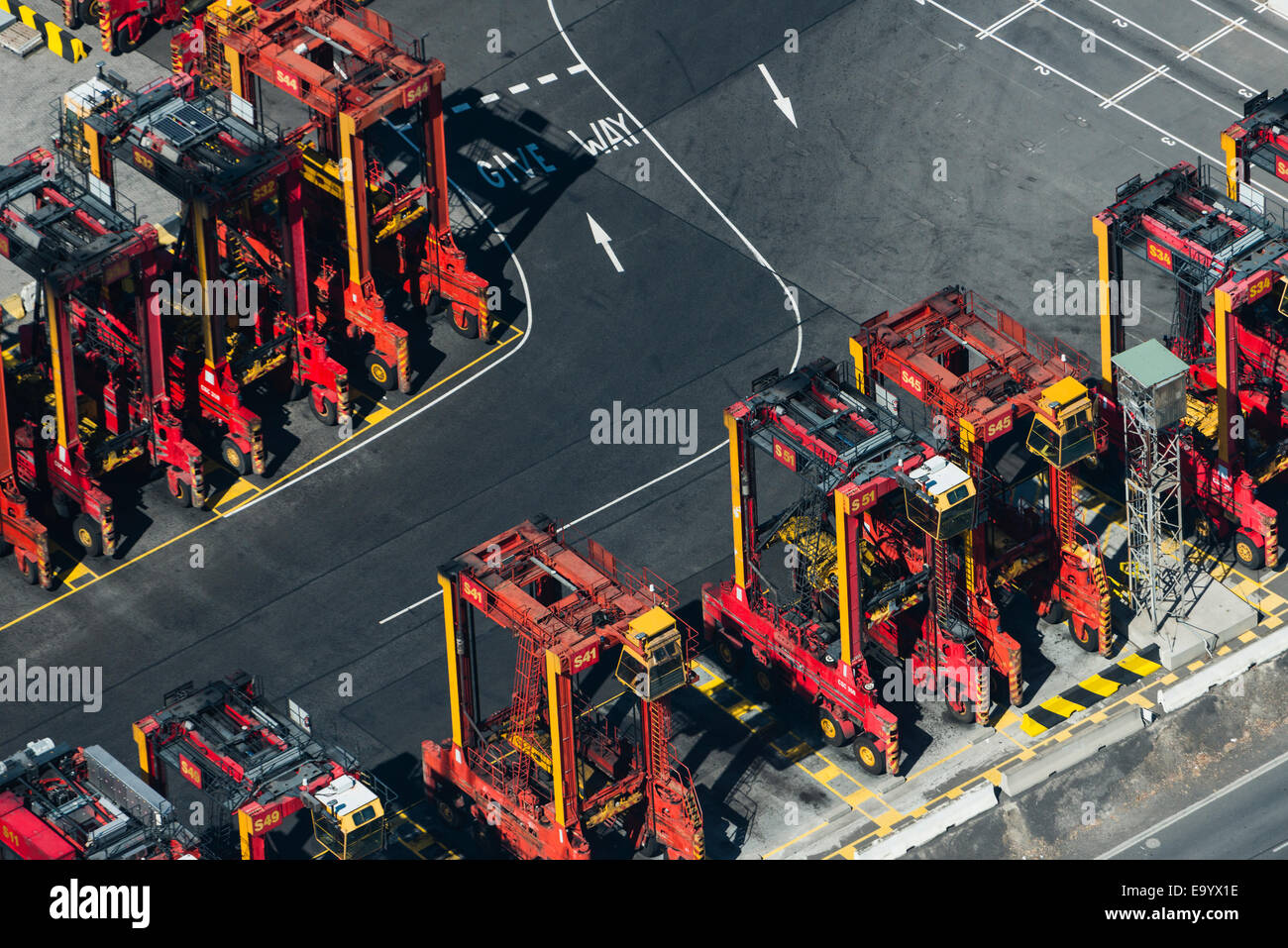 Aerial view of cargo container lifting trucks, Port Melbourne, Melbourne, Victoria, Australia Stock Photo