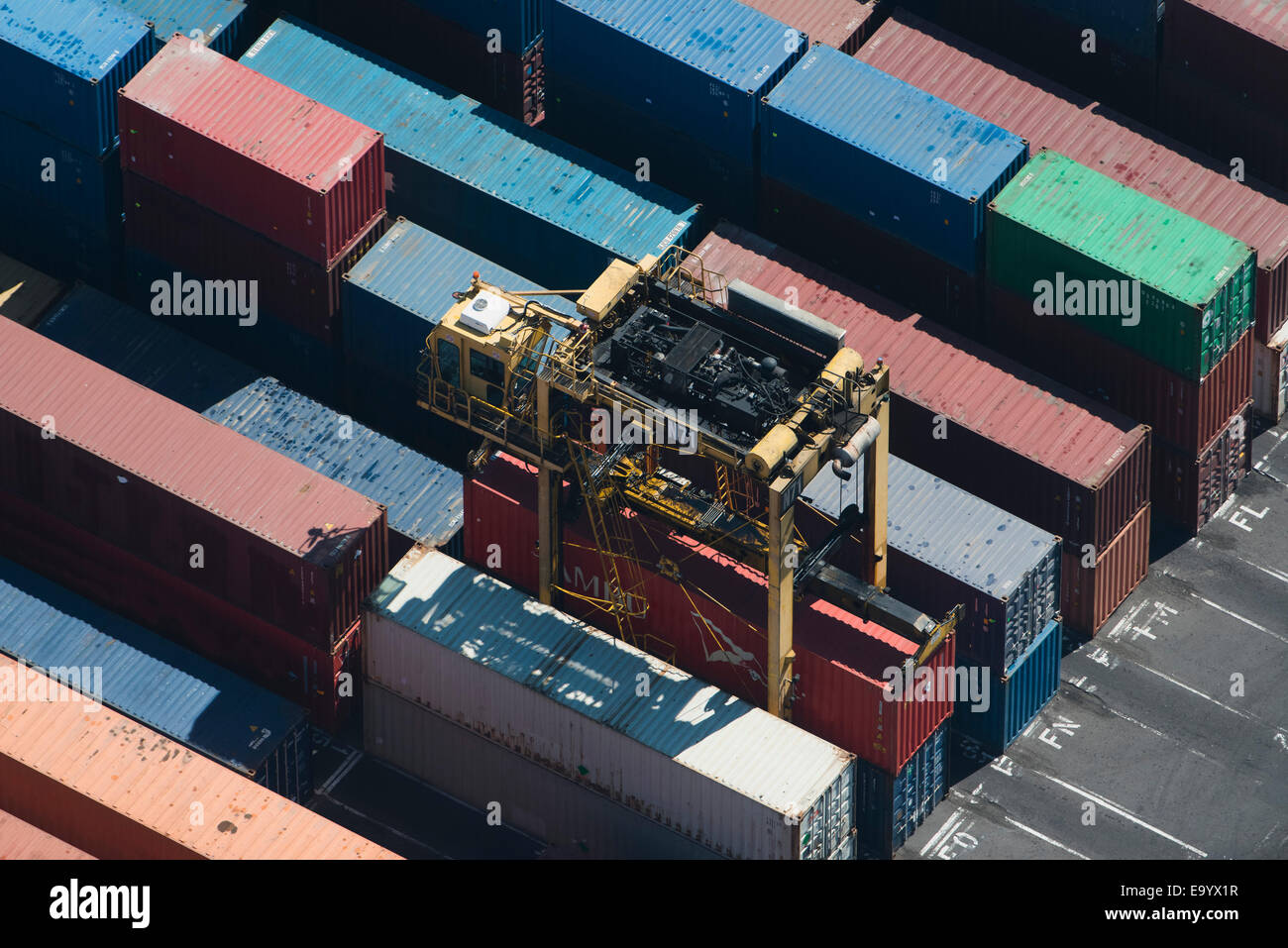 Aerial view of cargo container being retrieved, Port Melbourne, Melbourne, Victoria, Australia Stock Photo