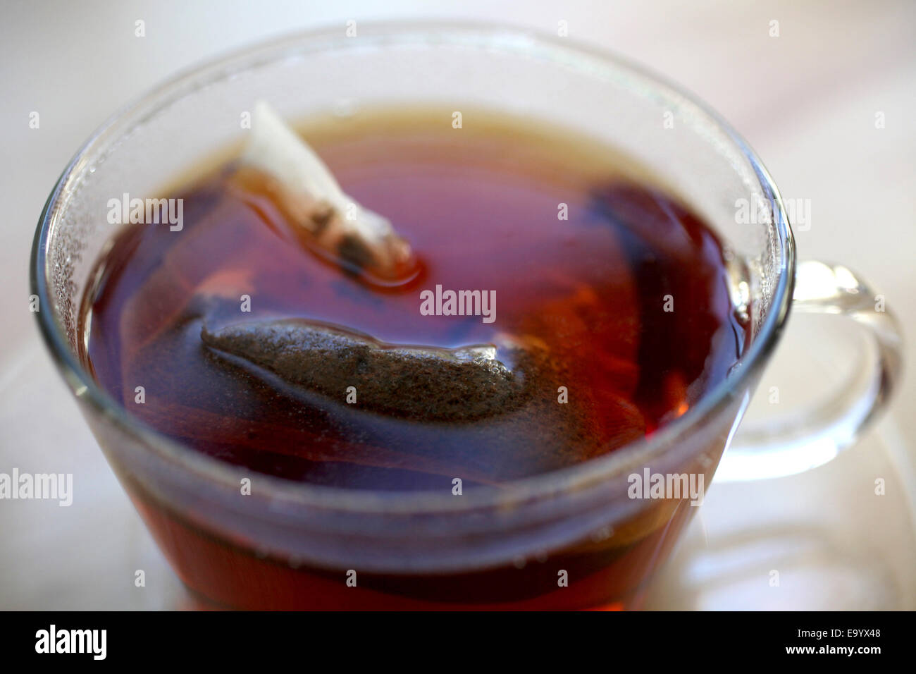 Tea in a glass mug with tea bag Stock Photo Alamy