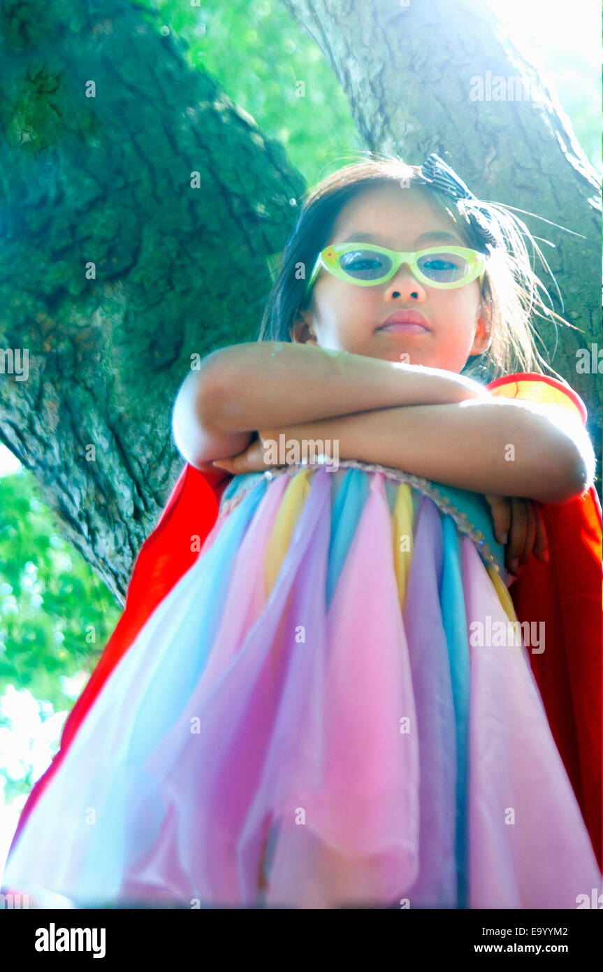 Portrait of young girl wearing fancy dress costume, low angle view Stock Photo