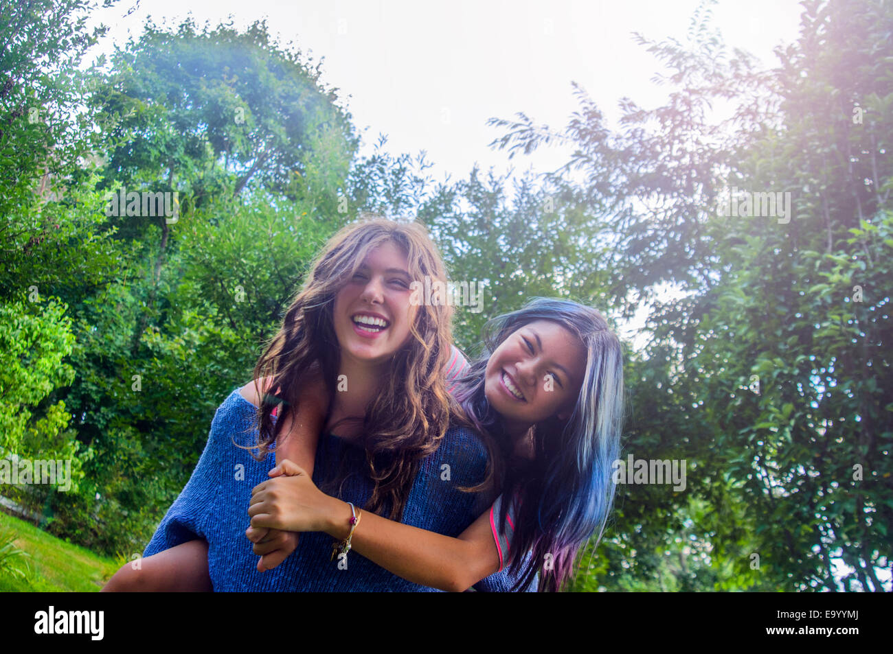 Two teenagers dancing messing around, outdoors Stock Photo