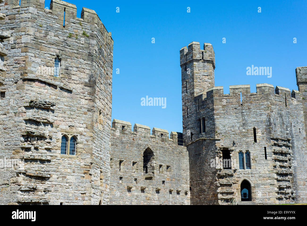 The exterior walls of Caernarfon Castle in North Wales Stock Photo
