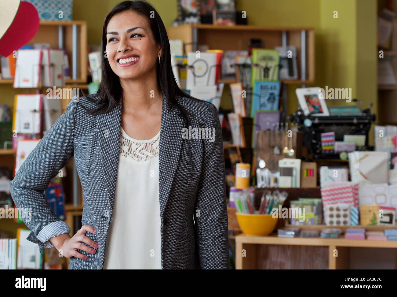 Portrait of female sales assistant in stationery shop Stock Photo