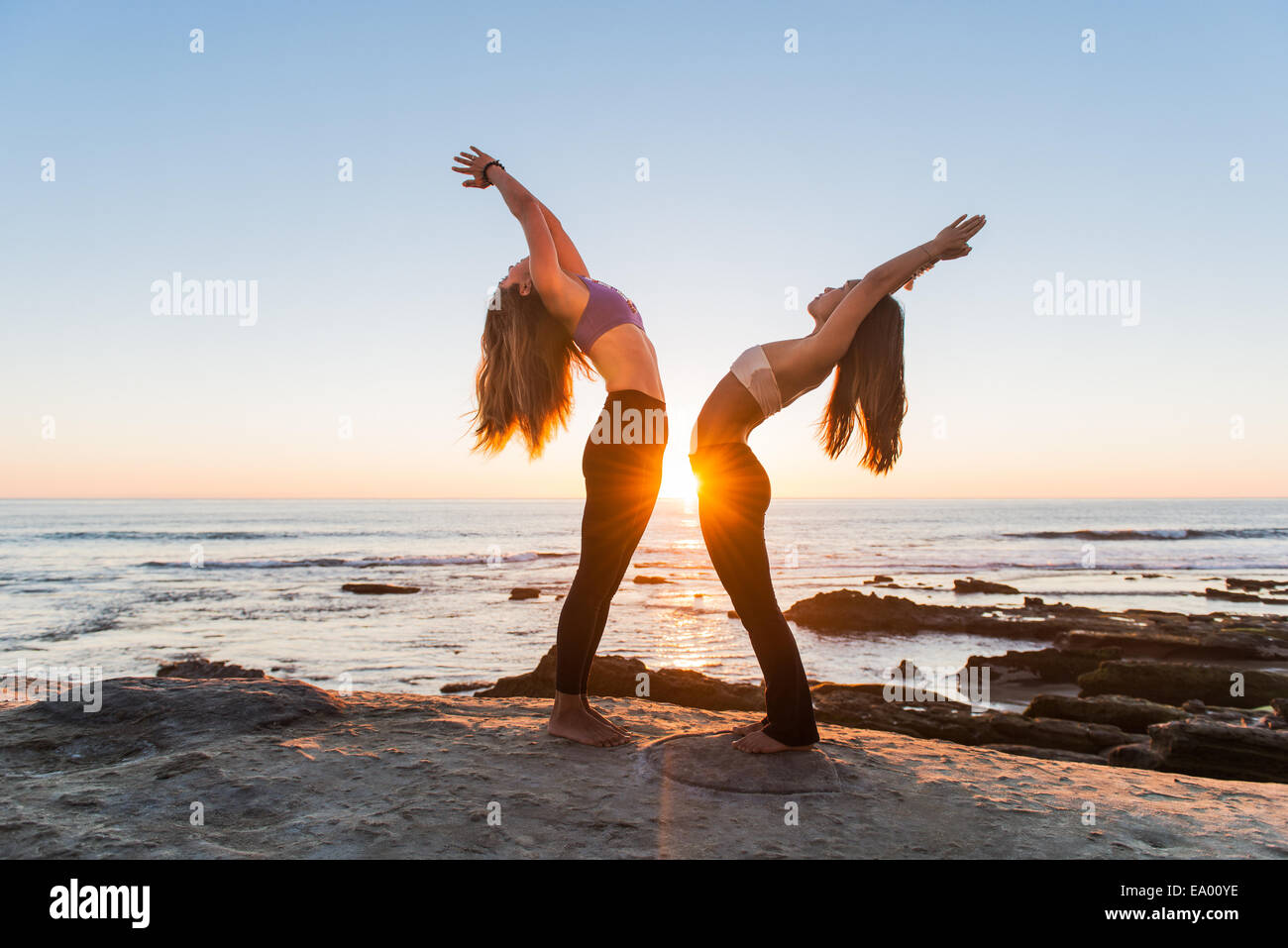 Backbend pose, Windansea beach, La Jolla, California Stock Photo