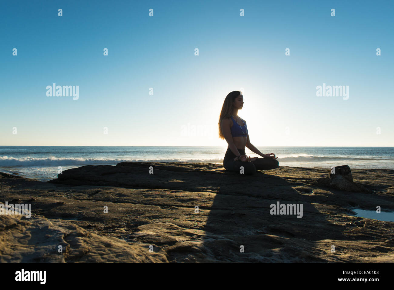 Lotus pose, Windansea beach, La Jolla, California Stock Photo