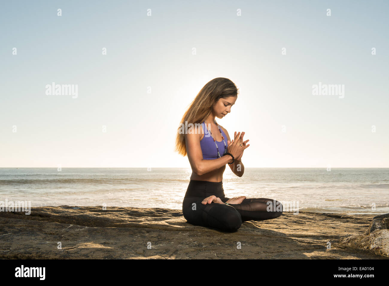 Lotus pose, Windansea beach, La Jolla, California Stock Photo