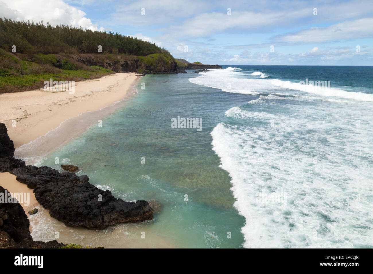 The beach and rocky coastline at Le Gris Gris, the southernmost point of Mauritius Stock Photo