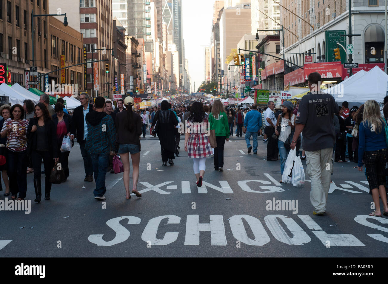 Crowds clog Broadway in Times Square after the city began closing