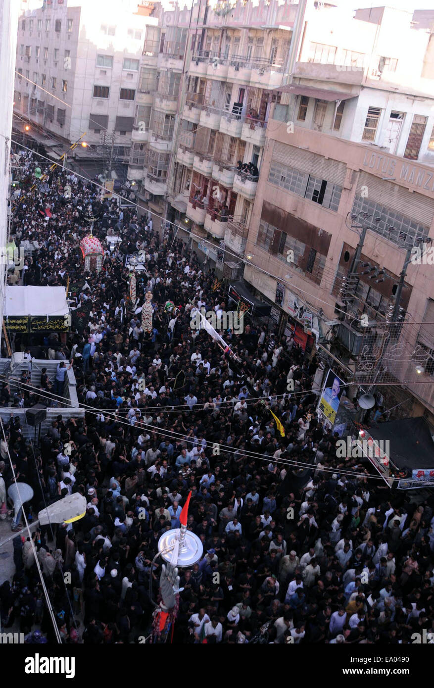 Karachi. 4th Nov, 2014. Pakistani Shiite Muslim devotees participate in ...
