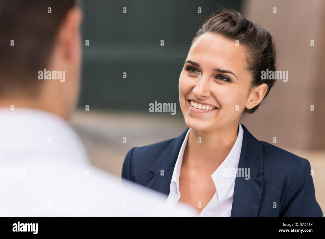 businesswoman and man chatting, London, UK Stock Photo