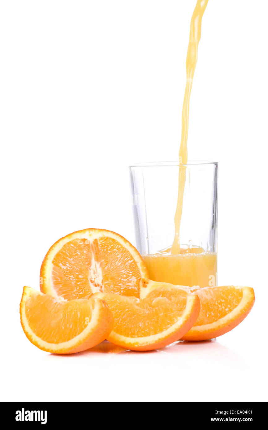 yellow orange slices and half juice in glass Stock Photo Alamy