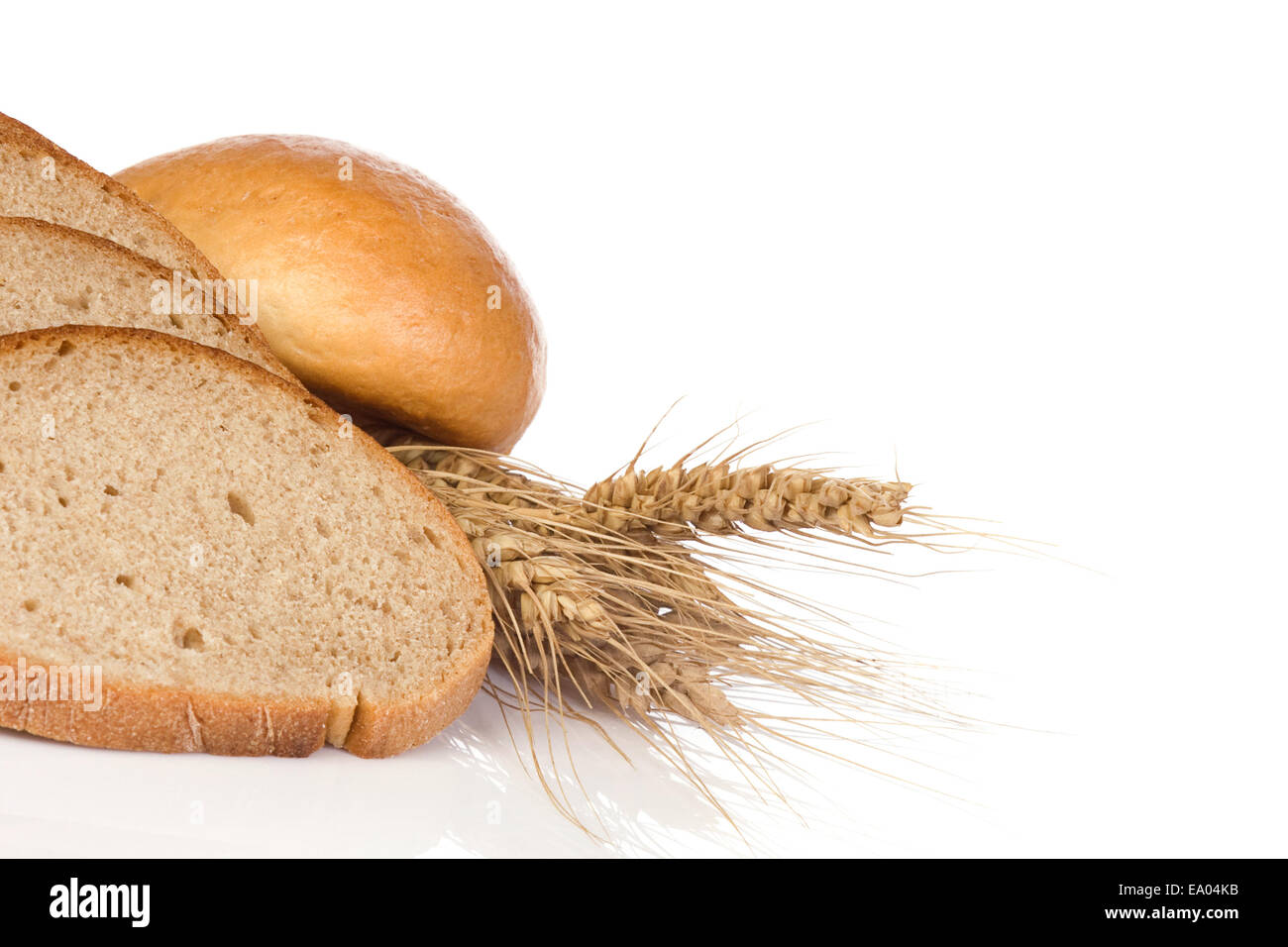 isolated bun and bread with wheat Stock Photo