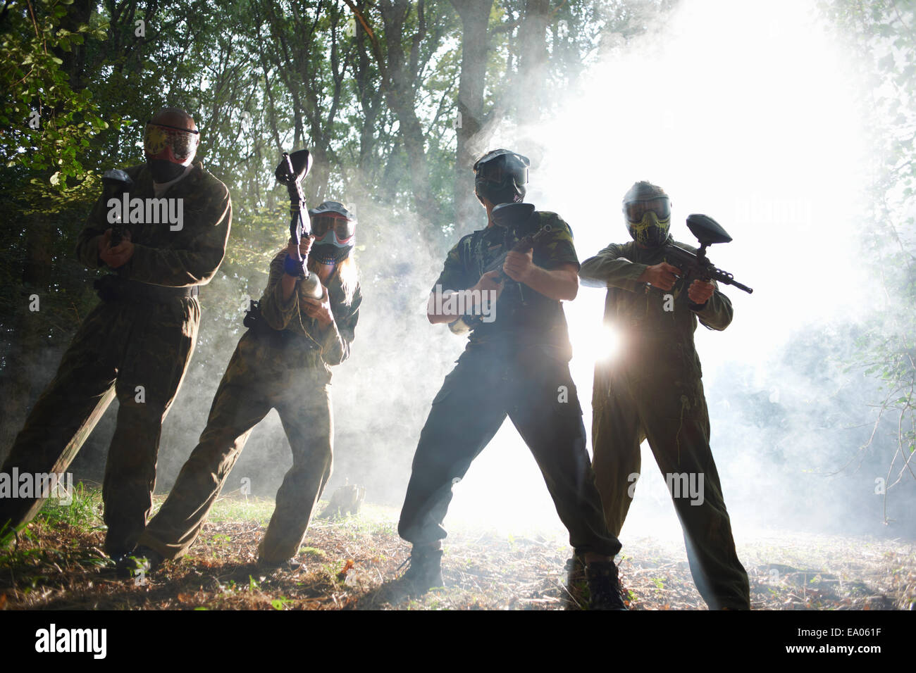 Paintball players in action Stock Photo Alamy