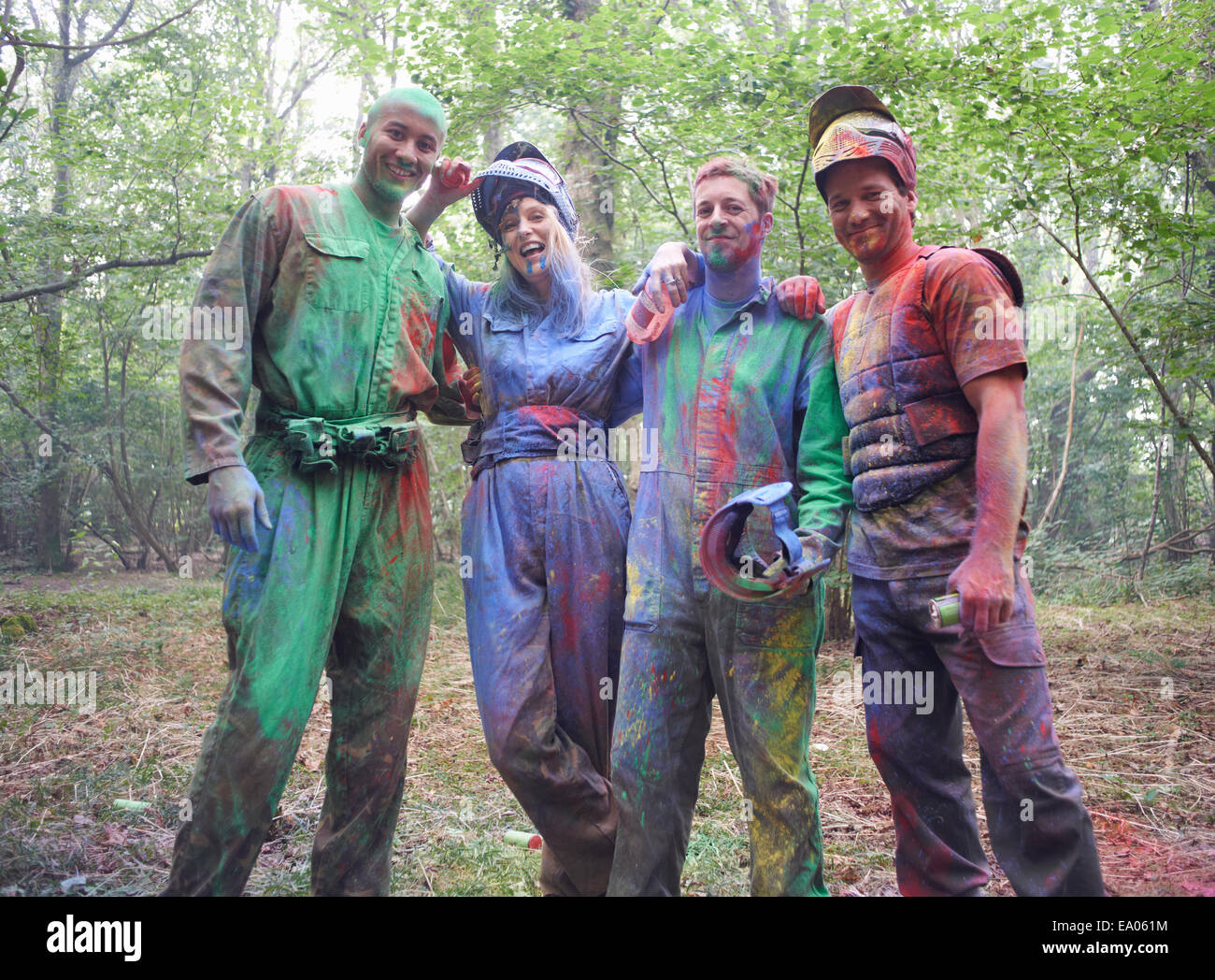 Paintball players in paintball wear marked with paint Stock Photo Alamy
