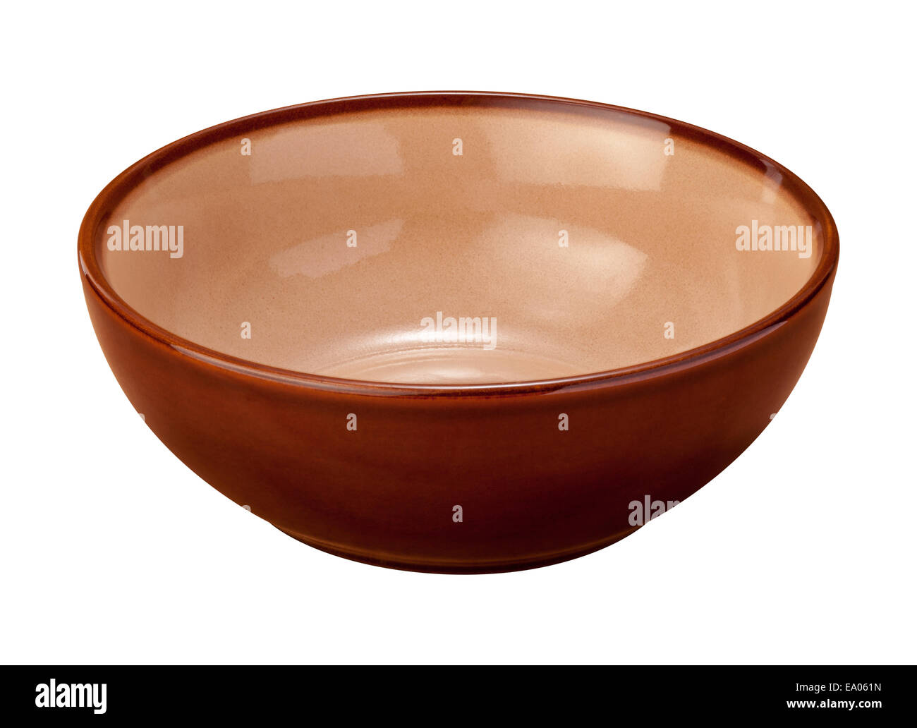 Empty brown ceramic bowl with a beige center. The subject is isolated on white. This photo was shot Stock Photo