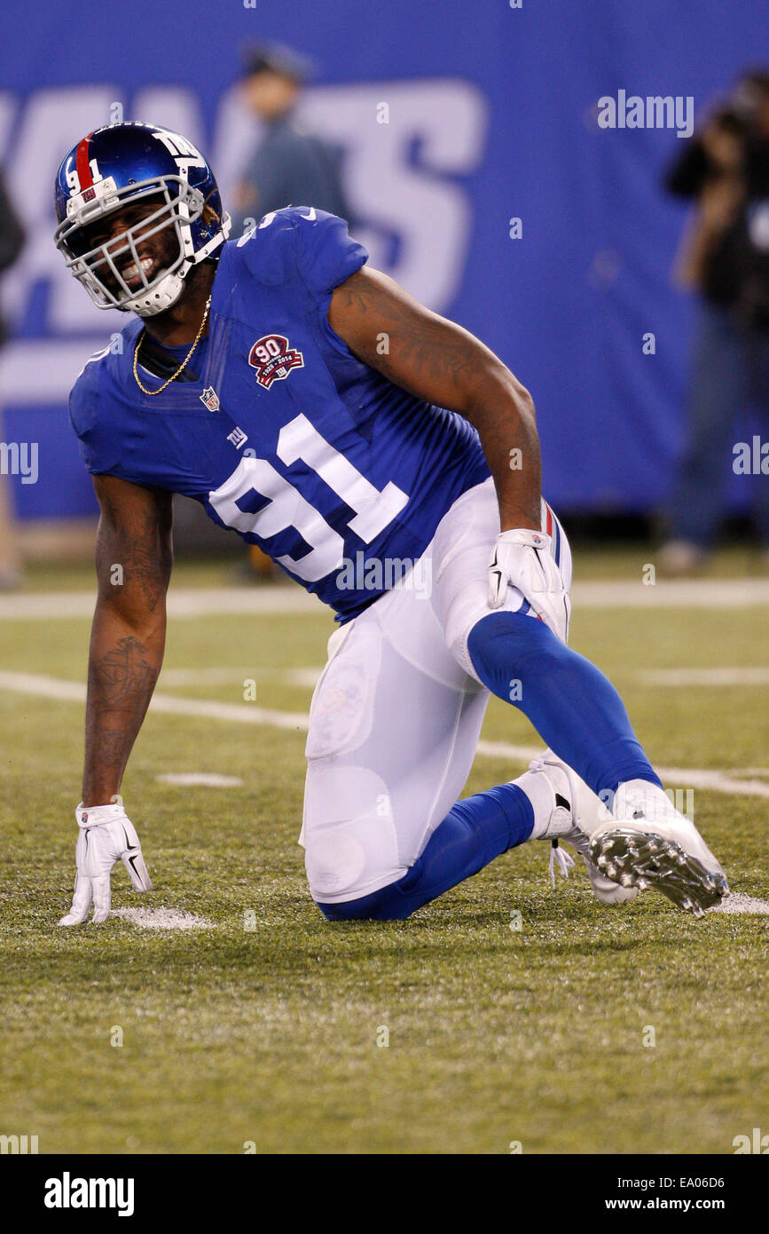 November 3, 2014: New York Giants defensive end Robert Ayers (91) reacts to pain in his left leg during the NFL game between the Indianapolis Colts and the New York Giants at MetLife Stadium in East Rutherford, New Jersey. The Indianapolis Colts won 40-24. (Christopher Szagola/Cal Sport Media) Stock Photo