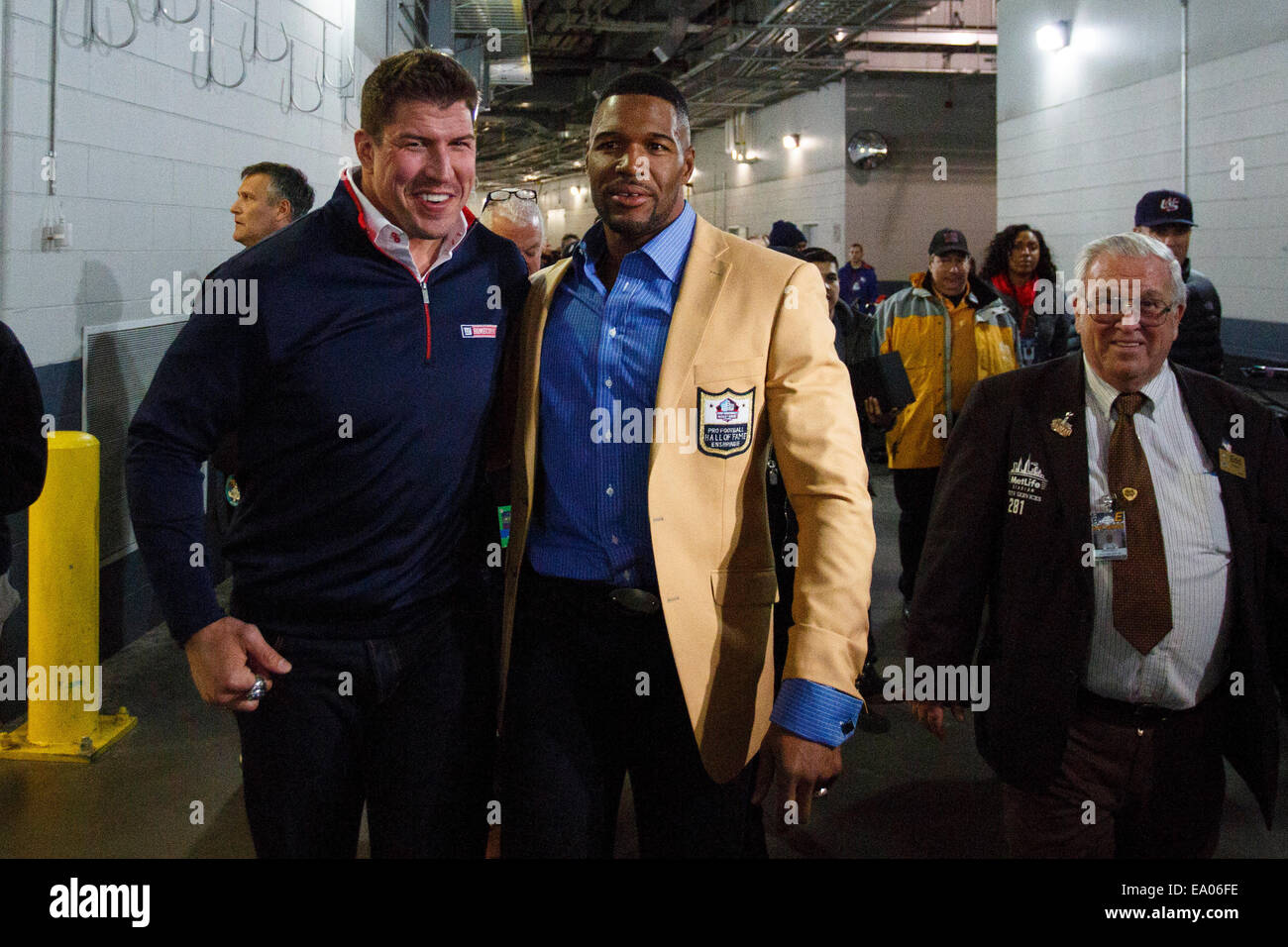 November 3, 2014: NFL Hall of Famer Michael Strahan talk with former Giant David Diehl after his ring ceremony during the NFL game between the Indianapolis Colts and the New York Giants at MetLife Stadium in East Rutherford, New Jersey. The Indianapolis Colts won 40-24. (Christopher Szagola/Cal Sport Media) Stock Photo