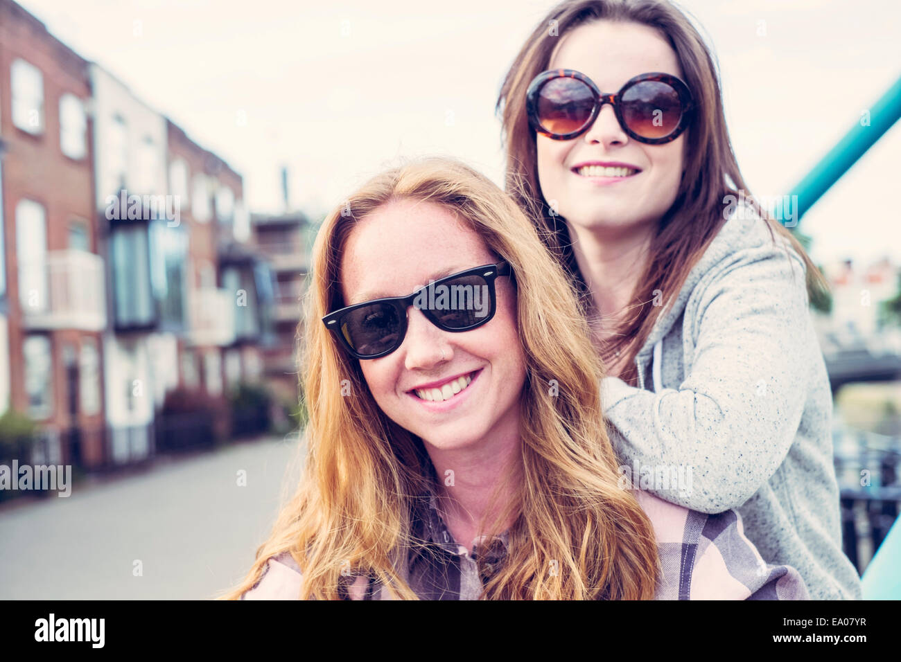 Portrait of two young female best friends in sunglasses Stock Photo