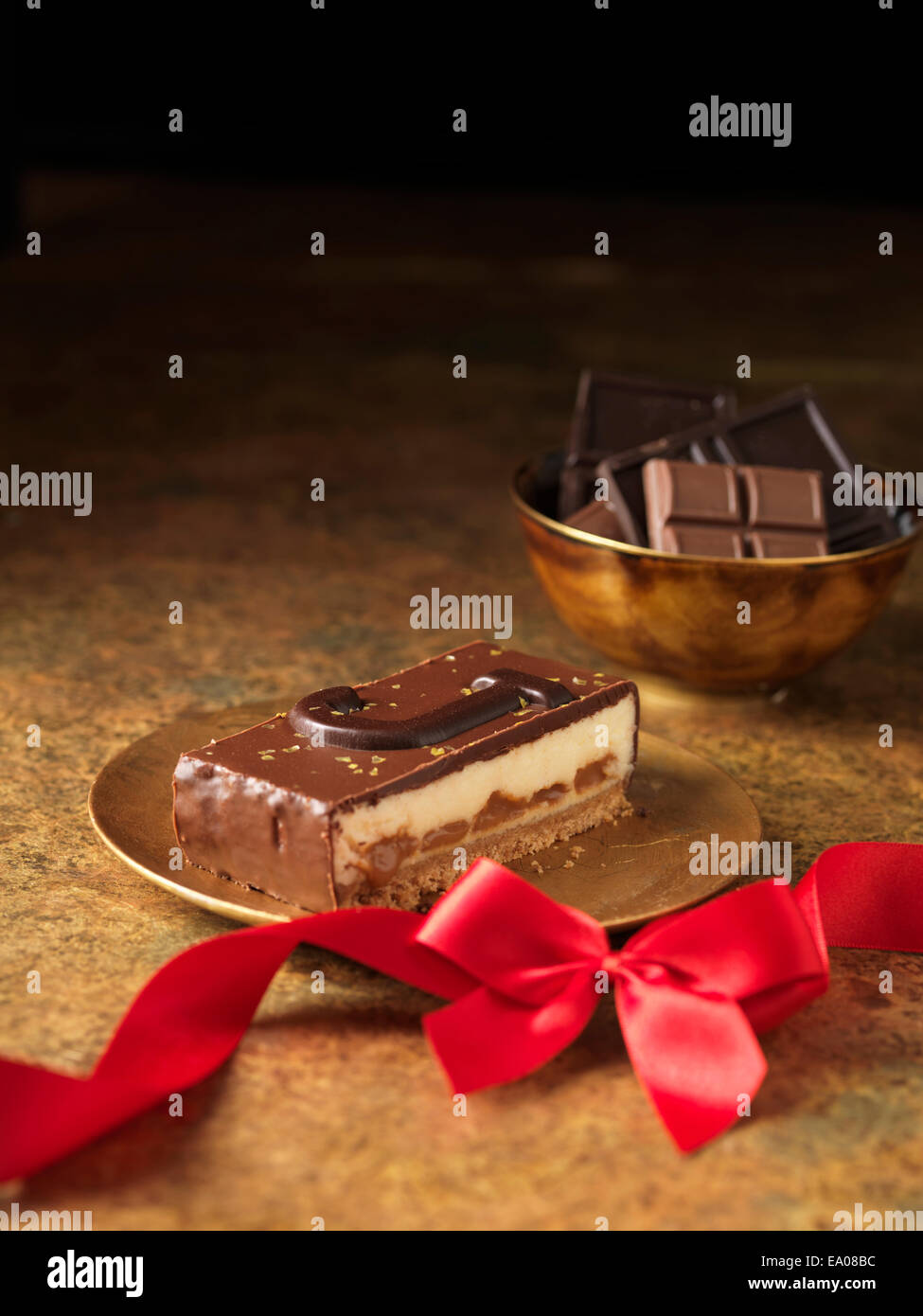Chocolate dessert slice with letter J Stock Photo