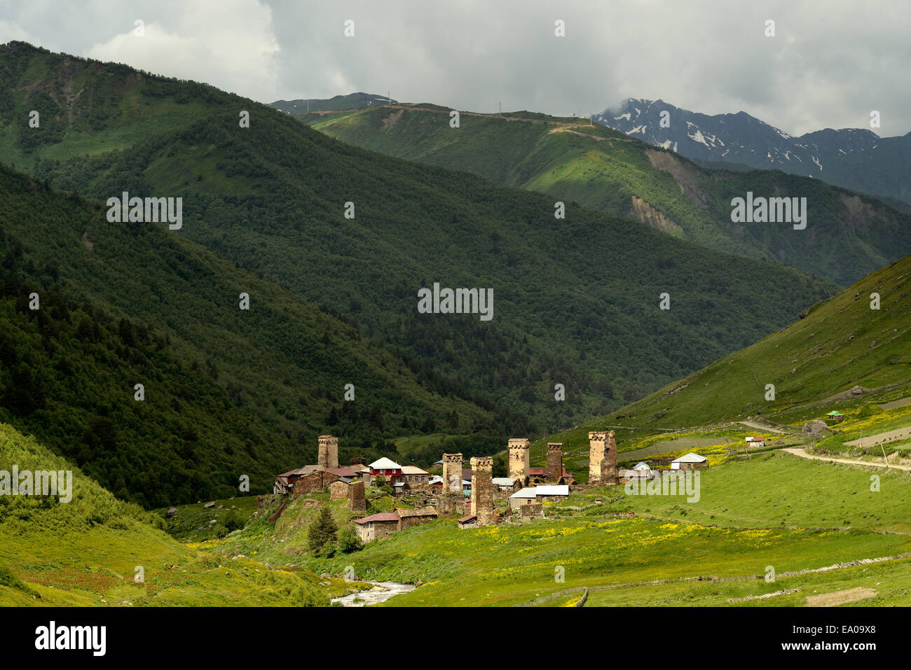 Distant view of old Svanetian towers in valley, Ushguli village, Svaneti, Georgia Stock Photo