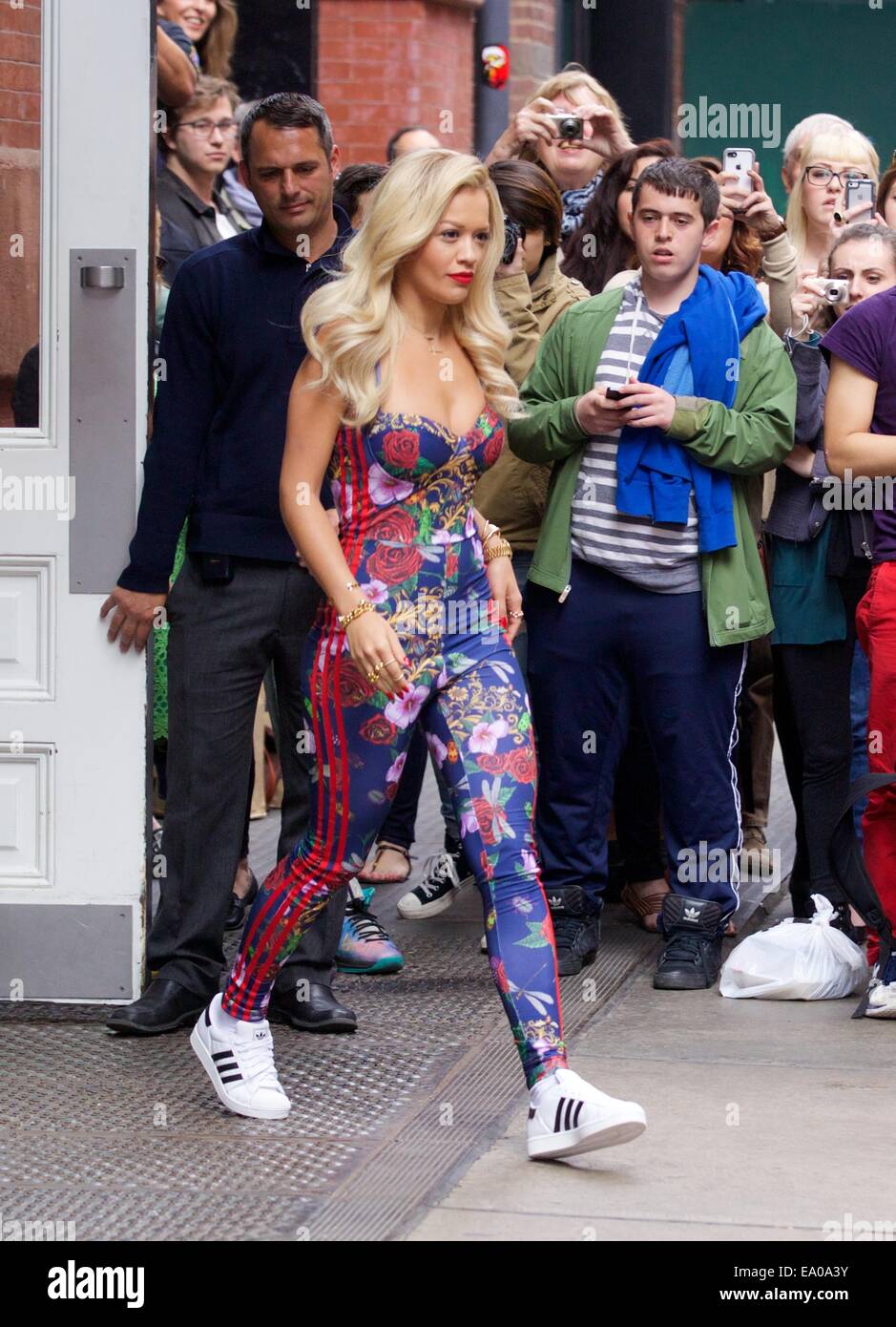 Ora spotted in Soho wearing Adidas sneakers and a wild printed jumpsuit Featuring: Rita Ora Where: New York City, New York, United States When: 02 May 2014 Stock Photo - Alamy