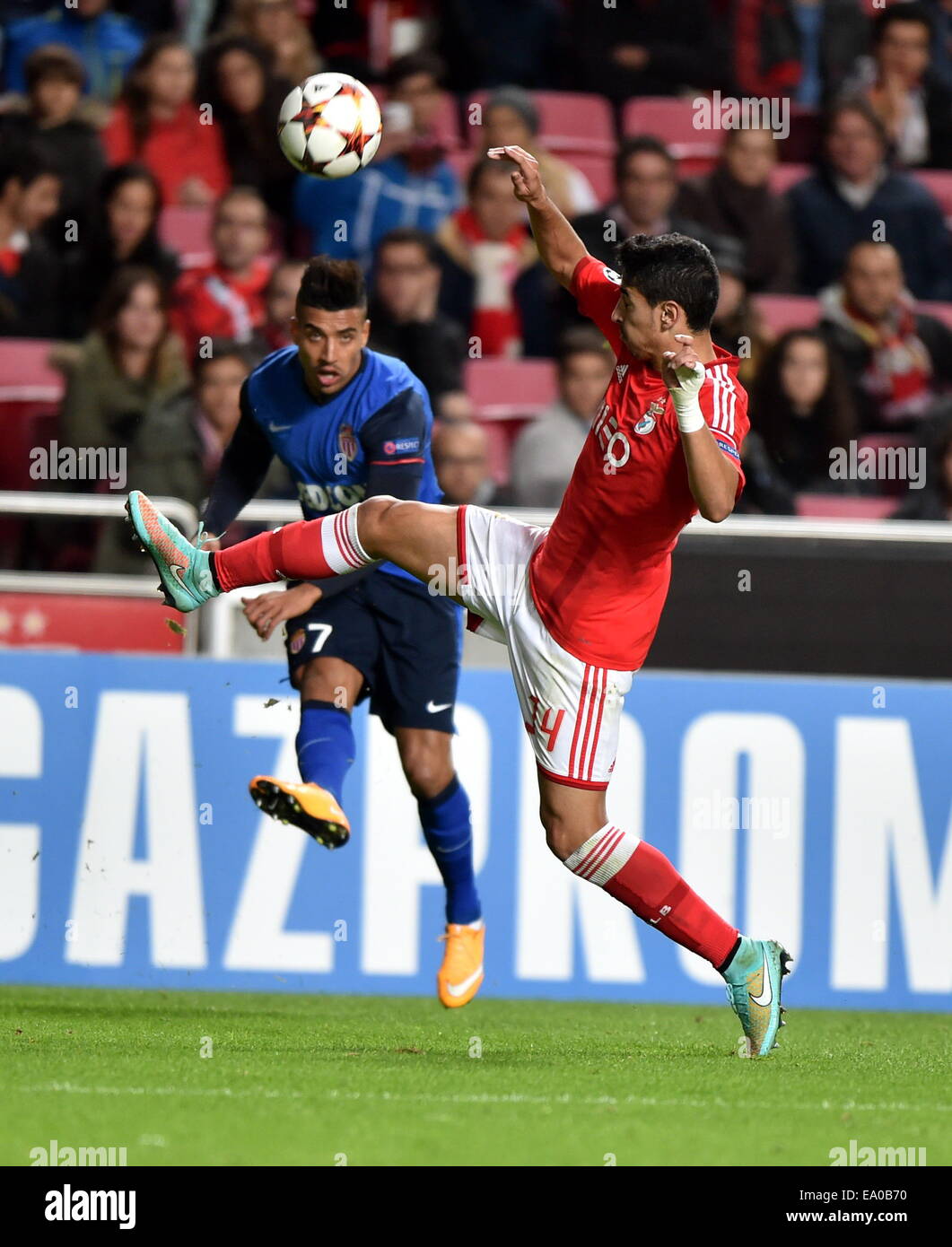Lisbon, Portugal. 4th Nov, 2014. Andre Almeida (R) of Benfica vies for the ball during the Champions League Group C soccer match against Monaco in Lisbon, Portugal, on Nov. 4, 2014. Benfica won 1-0. Credit:  Zhang Liyun/Xinhua/Alamy Live News Stock Photo