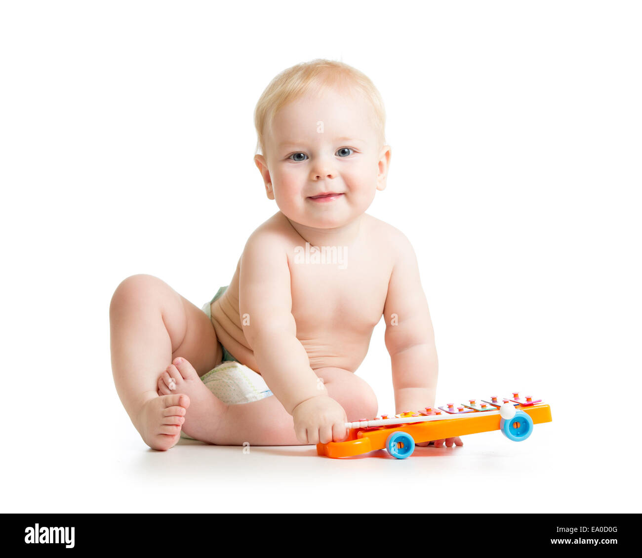 kid boy playing  with musical toy Stock Photo