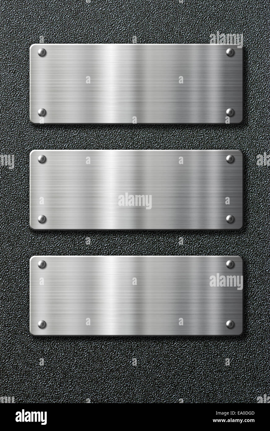 three stainless steel metal plates on black background Stock Photo