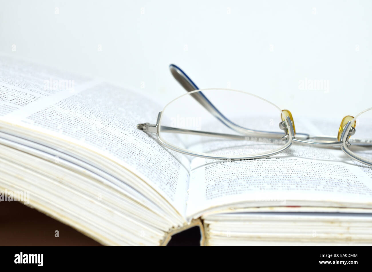 Glasses and book Stock Photo Alamy