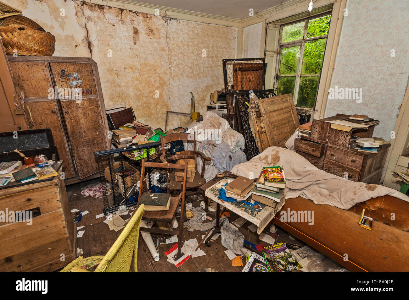 The bedroom of an abandoned and tumbledown house in Lincolnshire Stock Photo