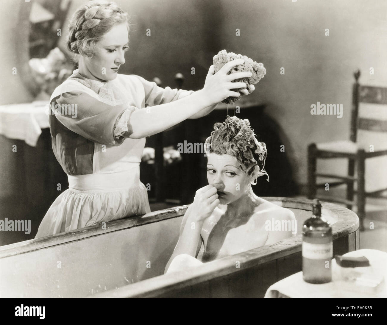 Woman vintage bathtub hi-res stock photography and images