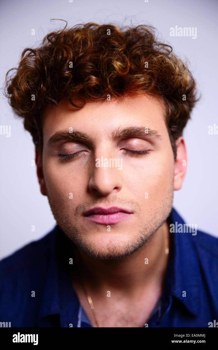 Curly Hair Man Blue Eyes High Resolution Stock Photography and Images ...